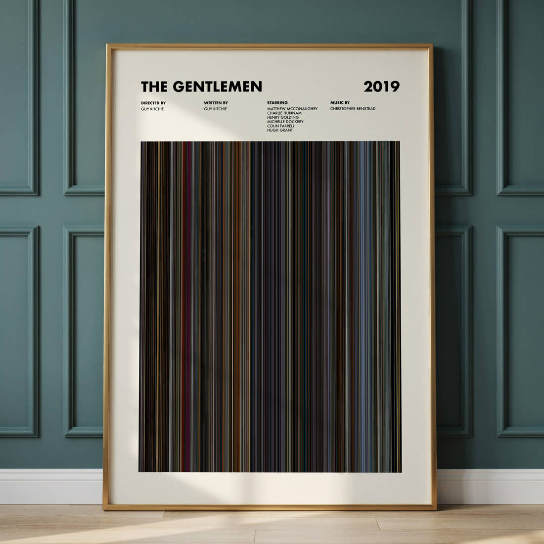 The Gentlemen Movie Barcode Poster framed and leaning against a panelled wall