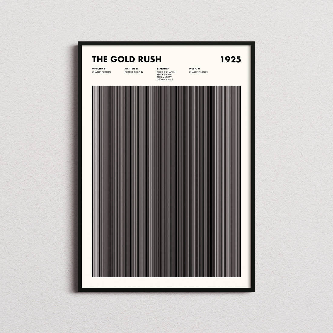 The Gold Rush Movie Barcode Poster framed on a plain studio wall