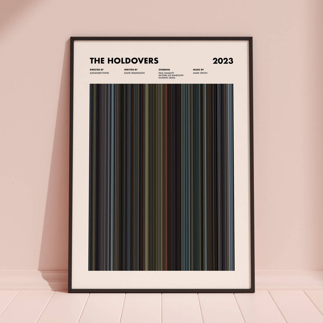 The Holdovers Movie Barcode Poster framed and leaning against a coloured wall