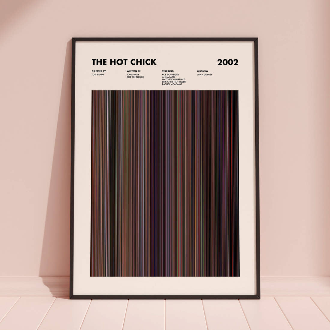 The Hot Chick Movie Barcode Poster framed and leaning against a coloured wall