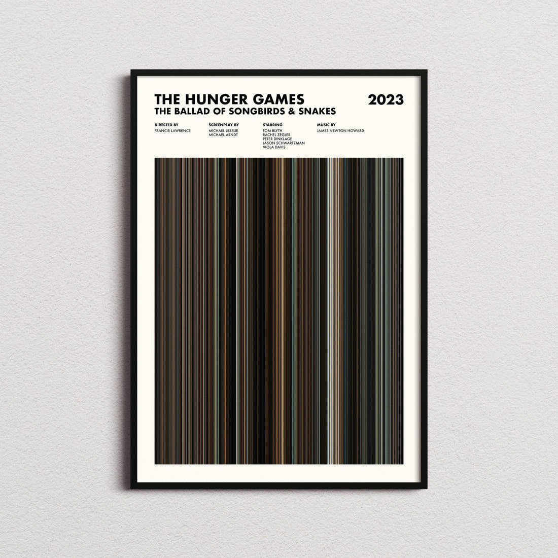 The Hunger Games: The Ballad of Songbirds & Snakes Movie Barcode Poster framed on a plain studio wall