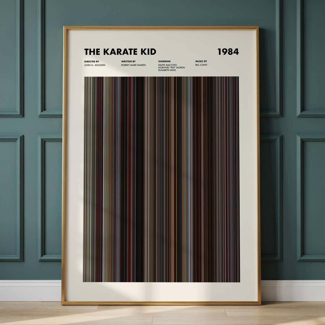 The Karate Kid Movie Barcode Poster framed and leaning against a panelled wall