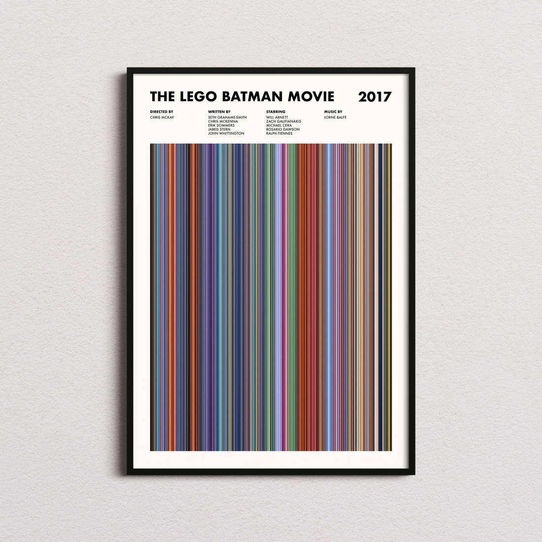 The Lego Batman Movie Barcode Poster framed on a plain studio wall