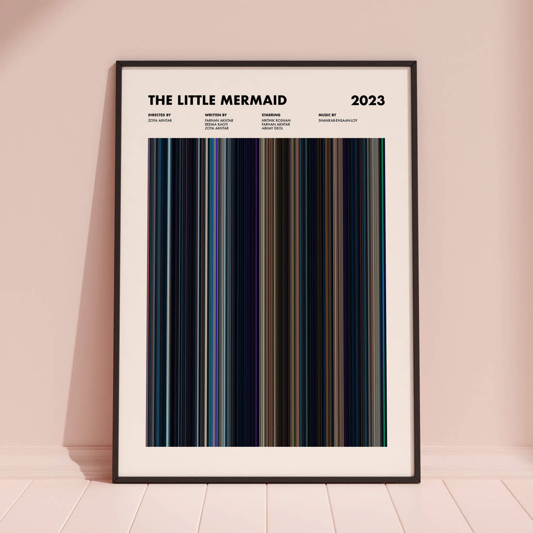 The Little Mermaid 2023 Movie Barcode Poster framed and leaning against a coloured wall