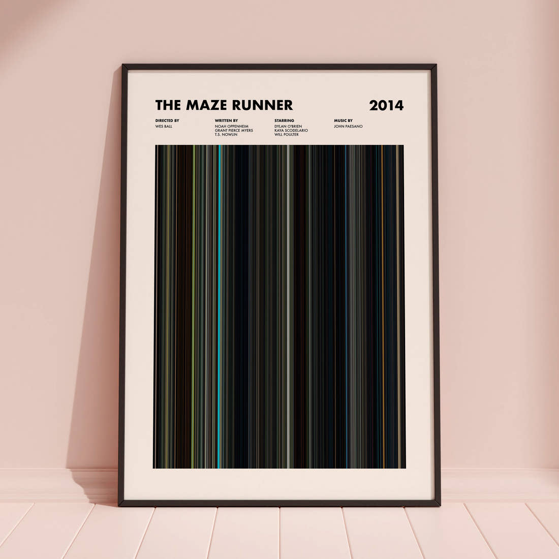 The Maze Runner Movie Barcode Poster framed and leaning against a coloured wall