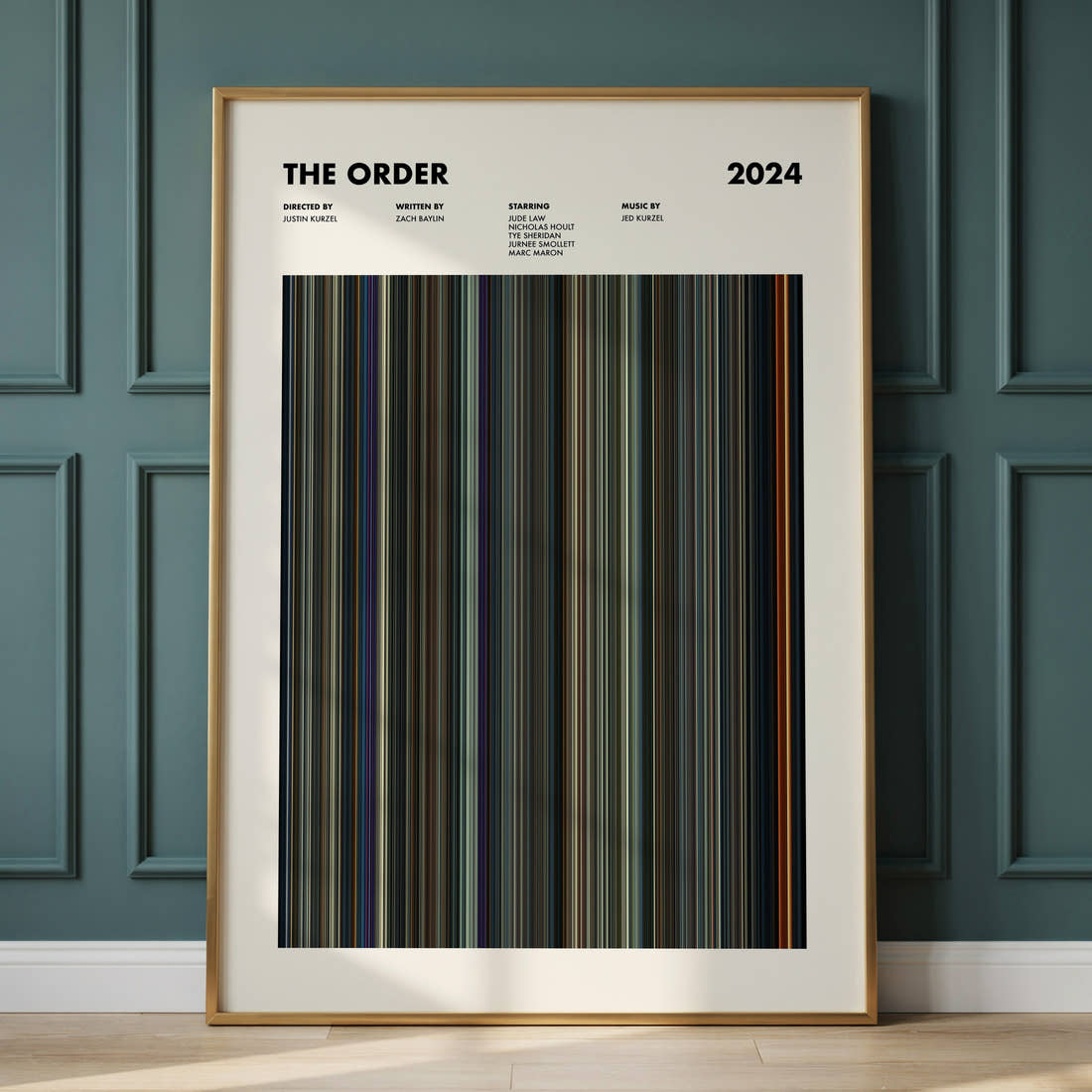 The Order Movie Barcode Poster framed and leaning against a panelled wall