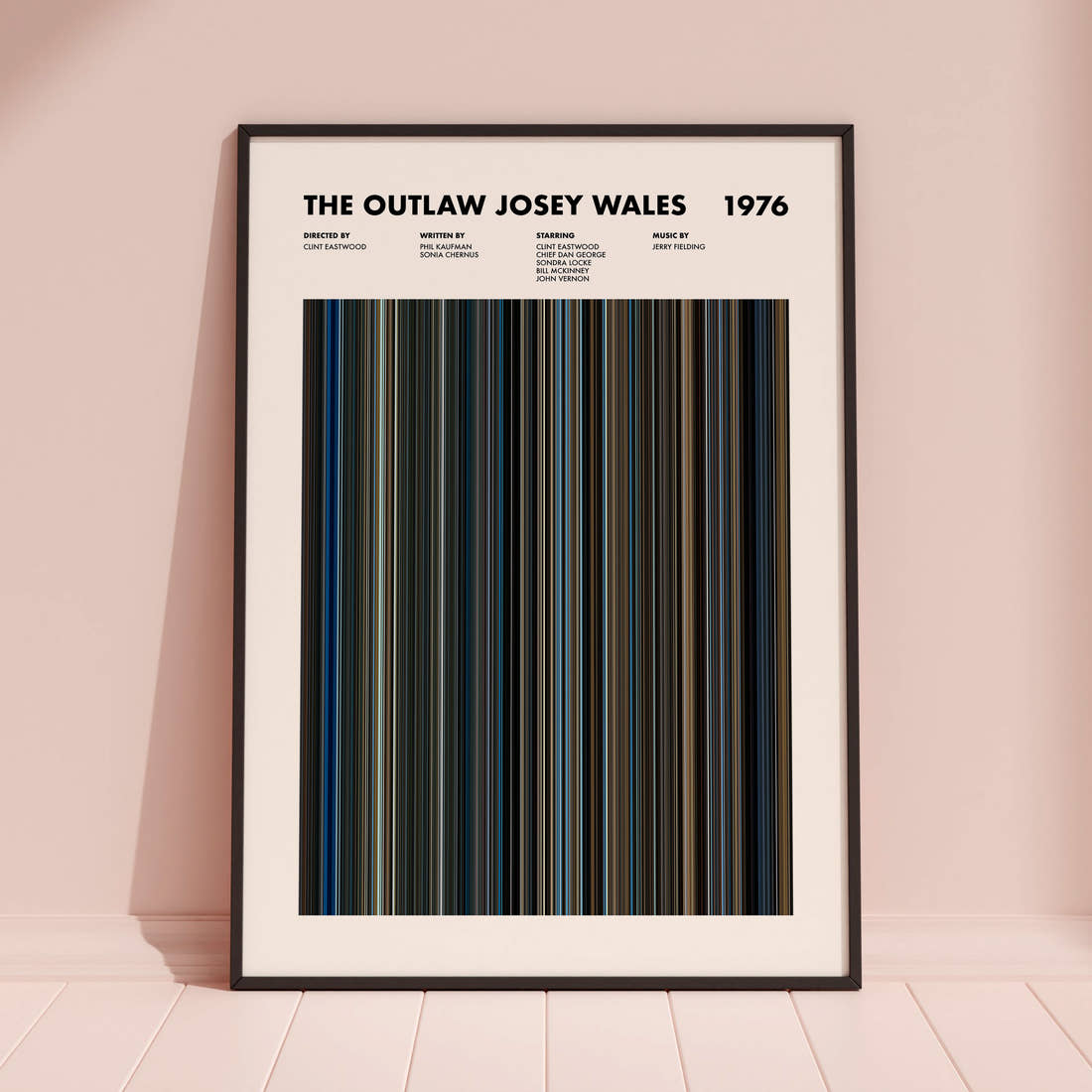 The Outlaw Josey Wales Movie Barcode Poster framed and leaning against a coloured wall