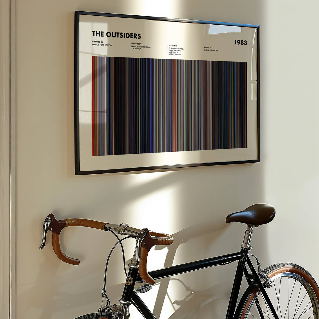 The Outsiders Movie Barcode Poster framed on the wall of a styled room setting
