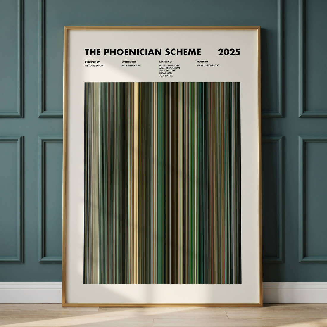 The Phoenician Scheme Movie Barcode Poster framed and leaning against a panelled wall