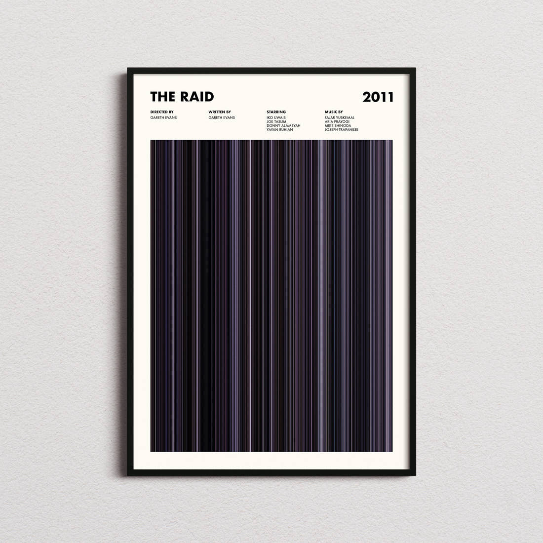 The Raid Movie Barcode Poster framed on a plain studio wall