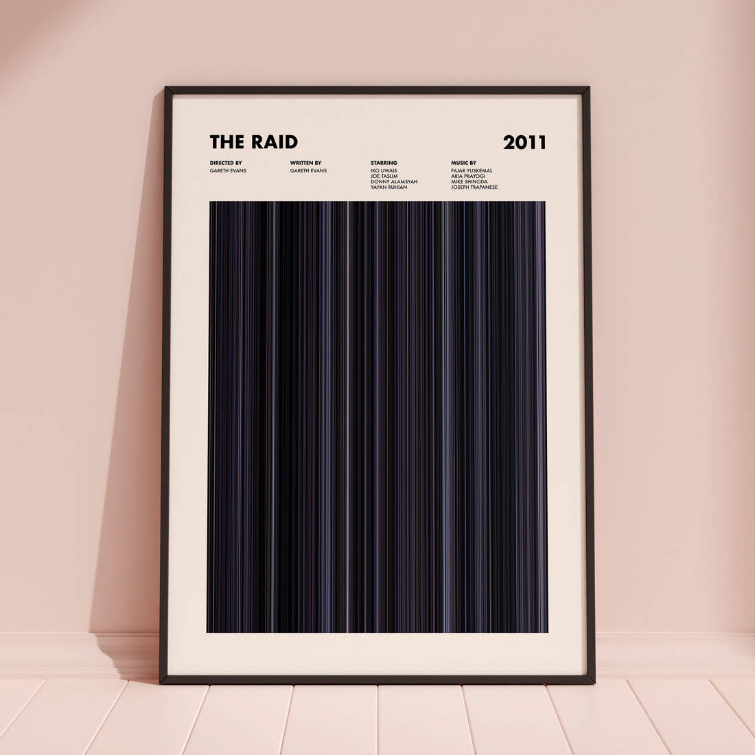 The Raid Movie Barcode Poster framed and leaning against a coloured wall