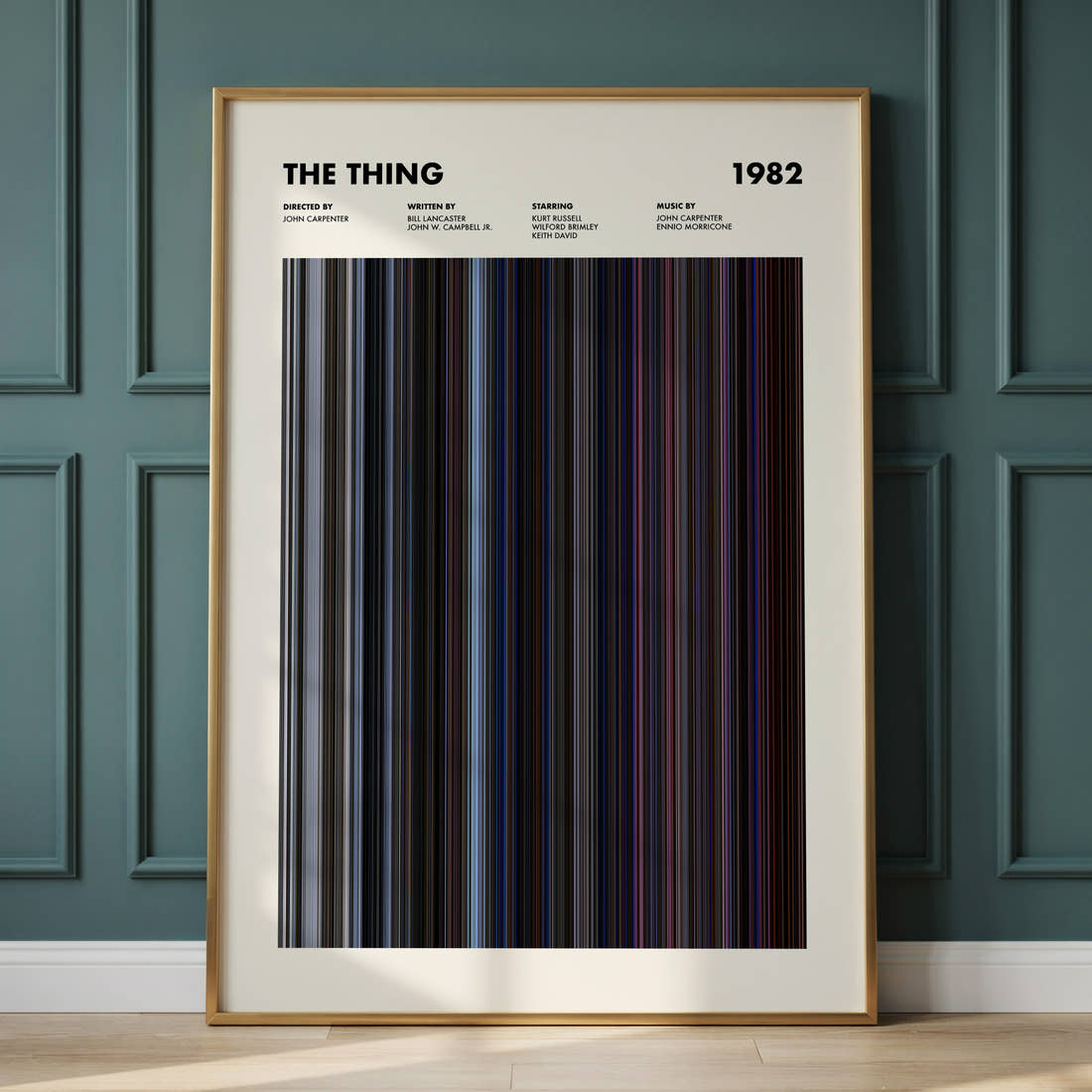 The Thing Movie Barcode Poster framed and leaning against a panelled wall