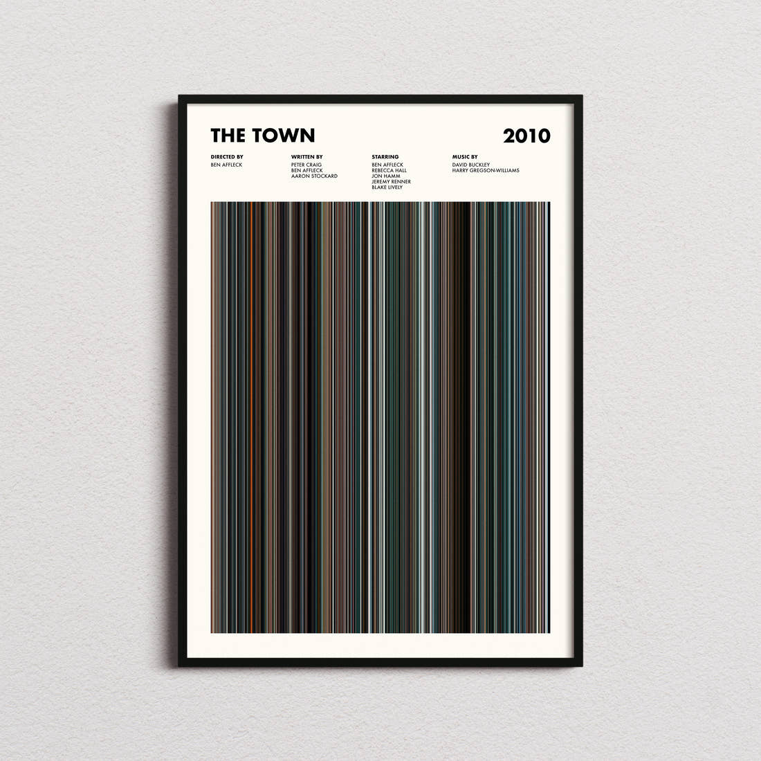 The Town Movie Barcode Poster framed on a plain studio wall