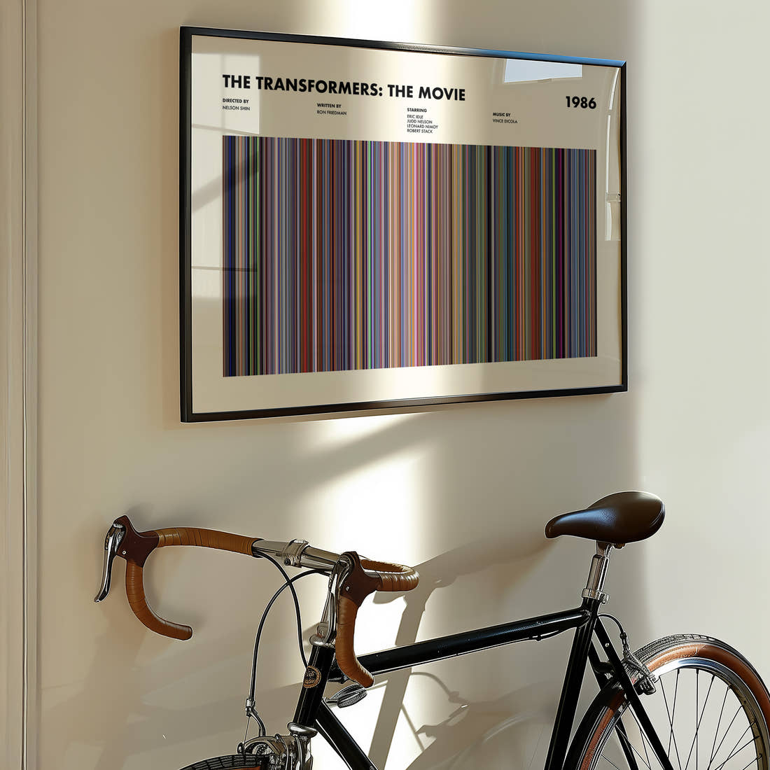 The Transformers: The Movie Movie Barcode Poster framed on the wall of a styled room setting