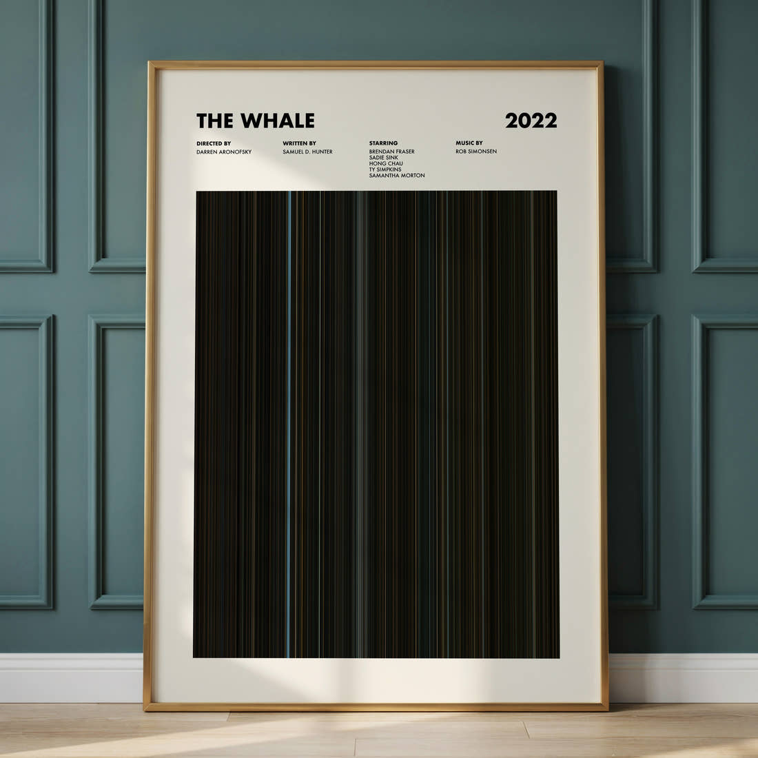 The Whale Movie Barcode Poster framed and leaning against a panelled wall
