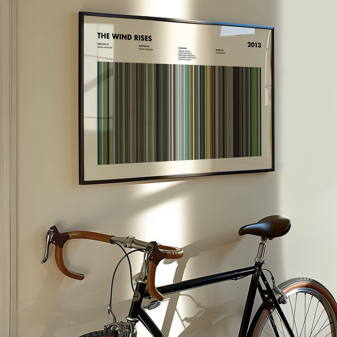 The Wind Rises Movie Barcode Poster framed on the wall of a styled room setting