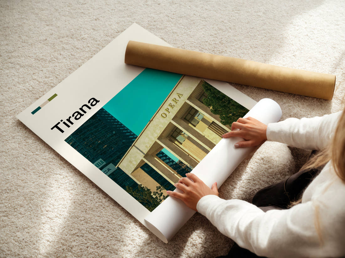 Tirana Opera House Facade Travel Print being unrolled from its postal tube