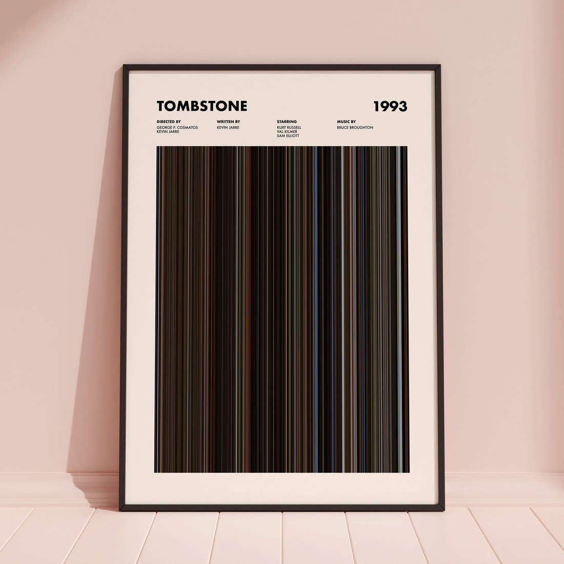 Tombstone Movie Barcode Poster framed and leaning against a coloured wall