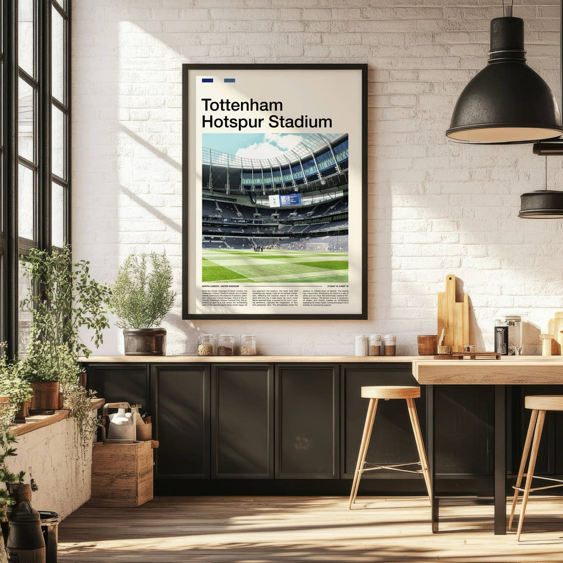 Tottenham Hotspur Stadium Print framed on the wall of a bright kitchen and dining space
