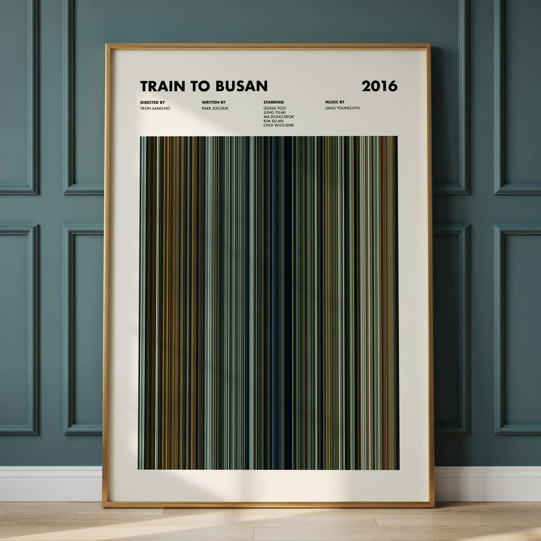 Train to Busan Movie Barcode Poster framed and leaning against a panelled wall