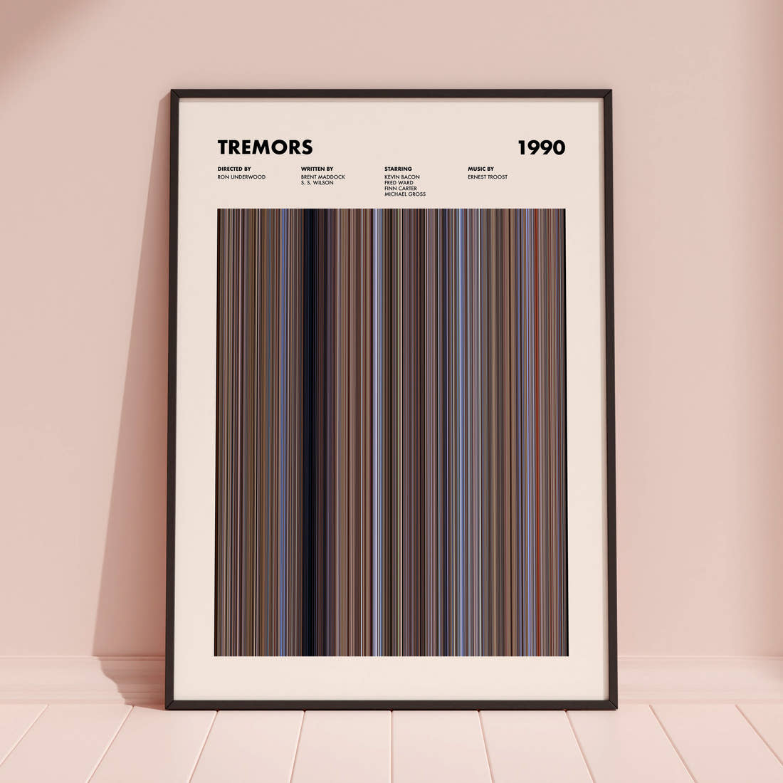 Tremors Movie Barcode Poster framed and leaning against a coloured wall