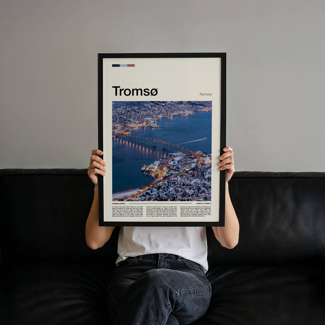 Tromsø Bridge At Dusk Travel Print held up by hand to show the size of the print