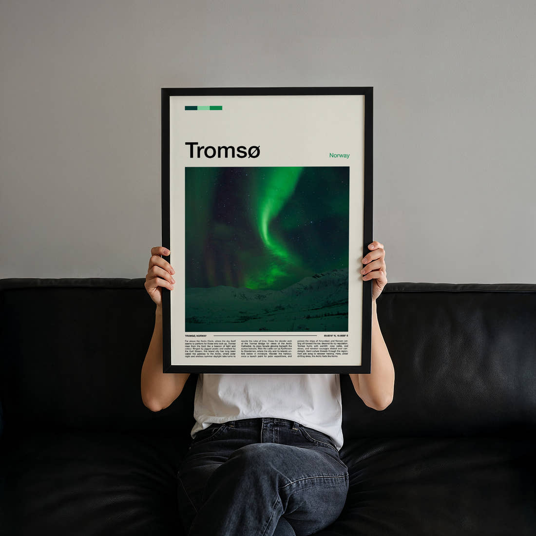Tromsø Aurora Over Mountains Travel Print held up by hand to show the size of the print