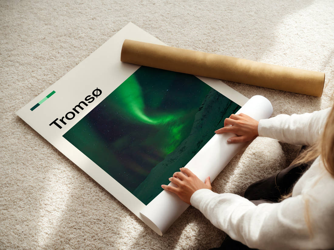 Tromsø Aurora Over Mountains Travel Print being unrolled from its postal tube