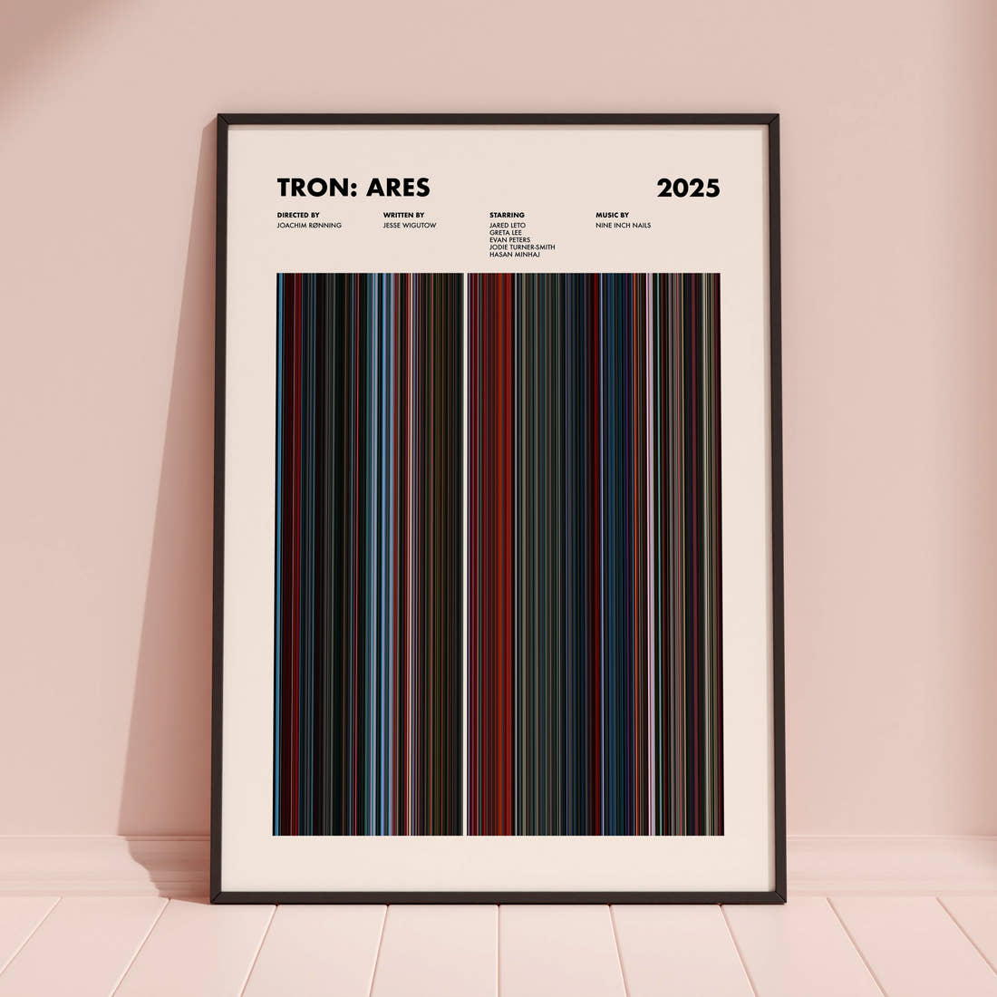 Tron: Ares Movie Barcode Poster framed and leaning against a coloured wall
