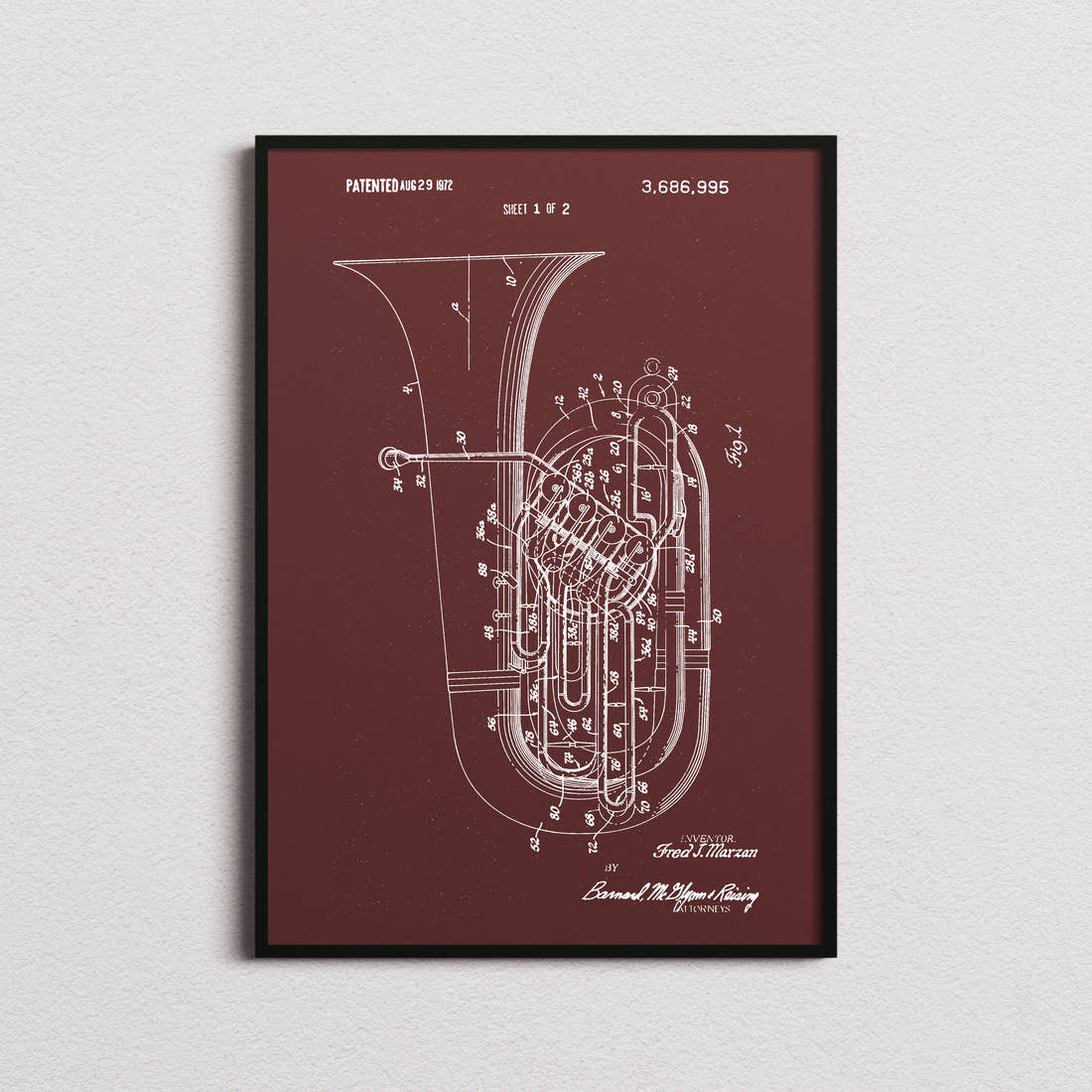 Tuba Patent Print in the burgundy colourway, framed