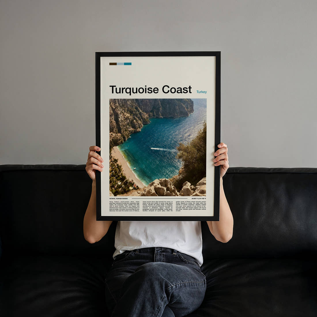 Turquoise Coast Aerial Cove View Travel Print held up by hand to show the size of the print