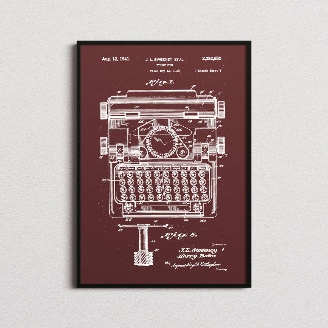 Typewriter Patent Print in the burgundy colourway, framed