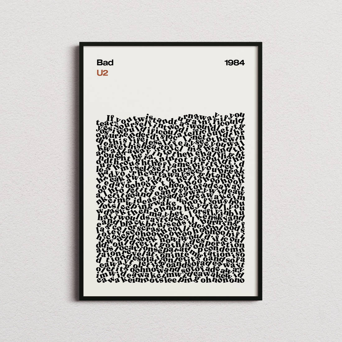 U2 Bad Lyric Print in the cream colourway, framed