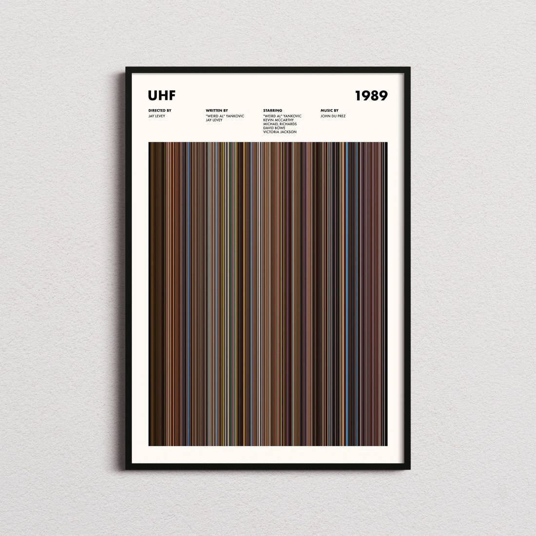 UHF Movie Barcode Poster framed on a plain studio wall