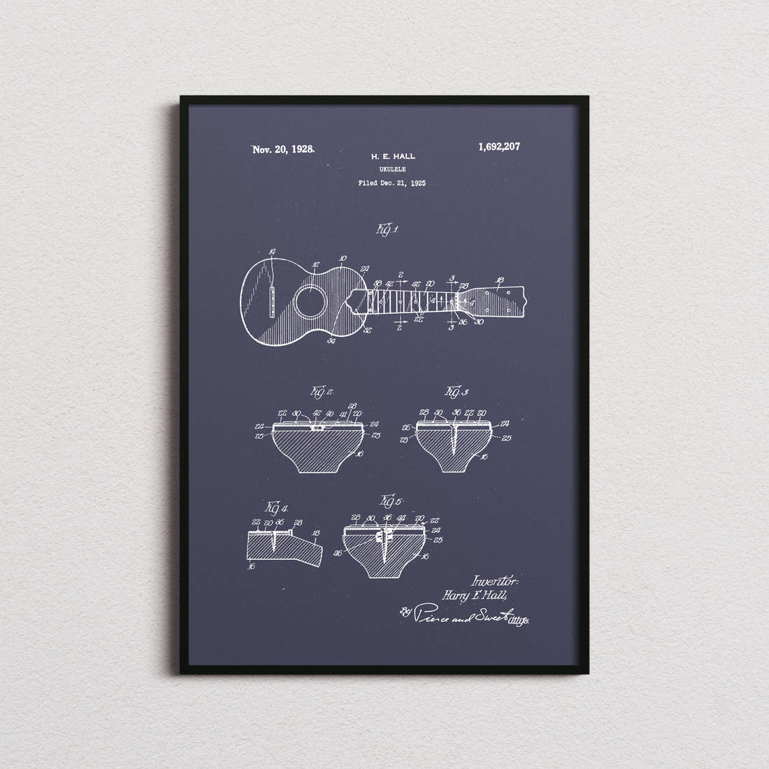 Ukelele Patent Print in the navy colourway, framed