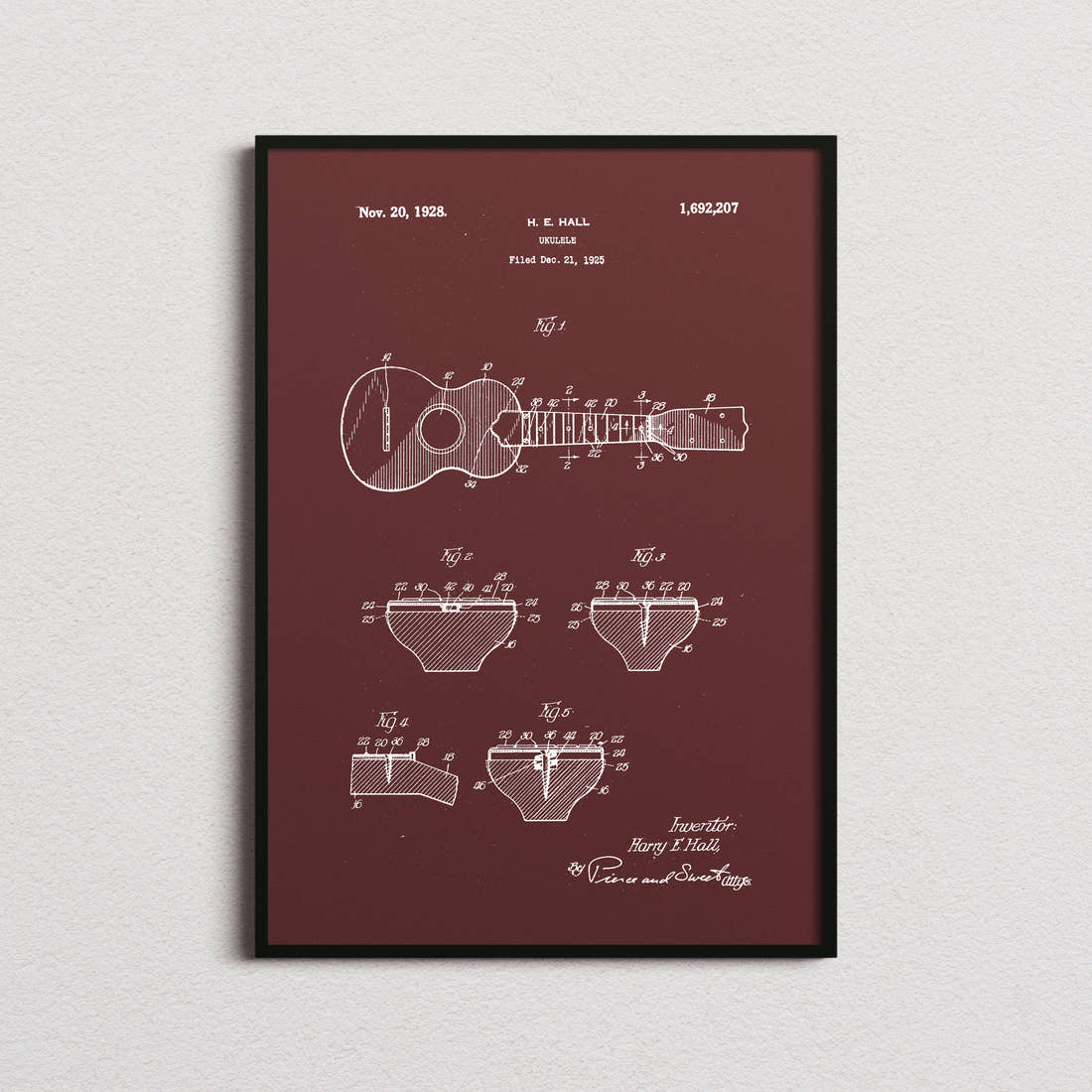 Ukelele Patent Print in the burgundy colourway, framed