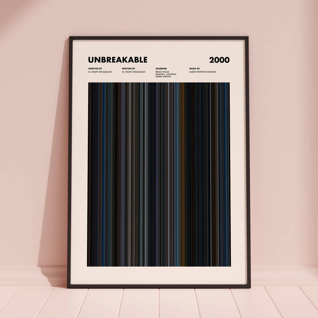 Unbreakable Movie Barcode Poster framed and leaning against a coloured wall