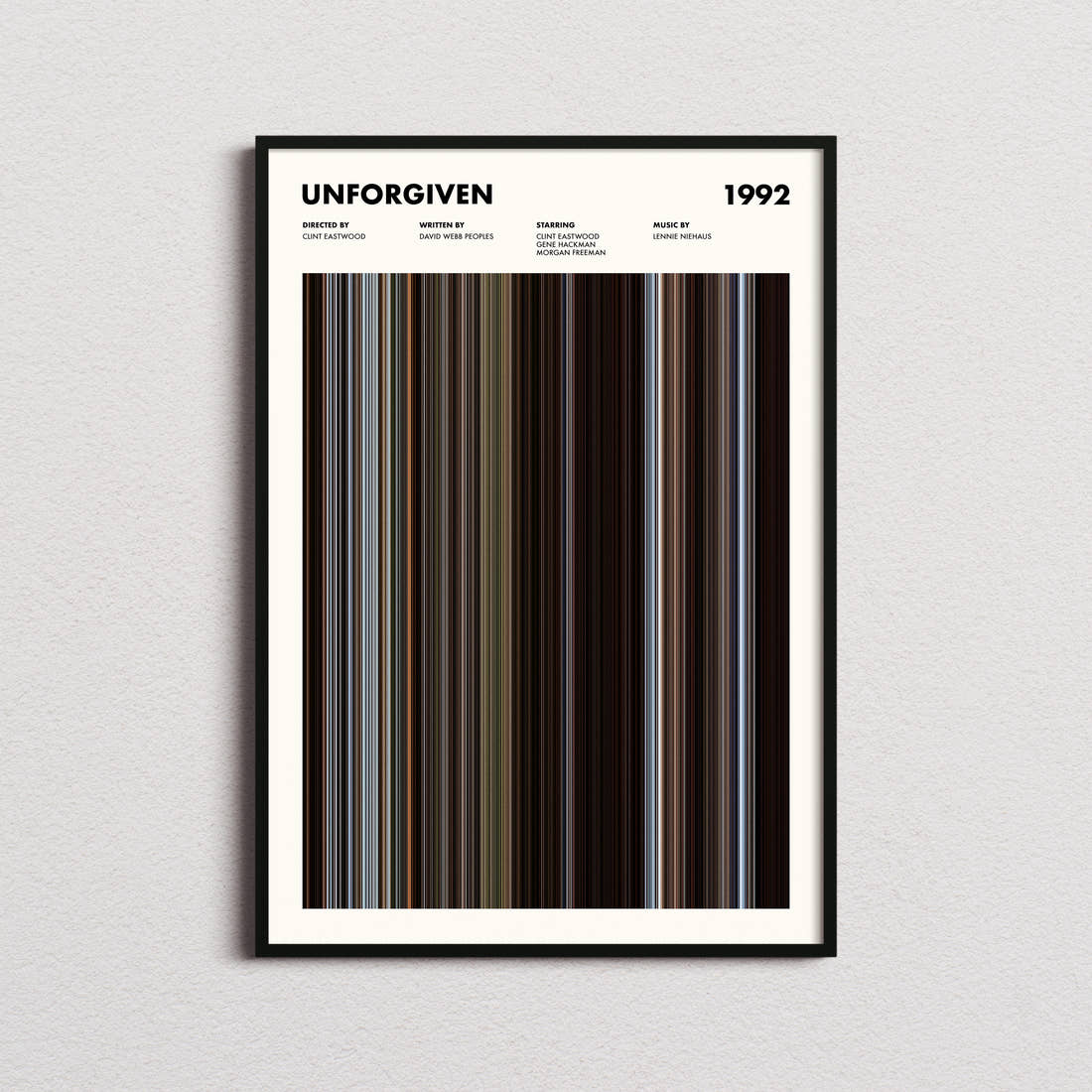 Unforgiven Movie Barcode Poster framed on a plain studio wall