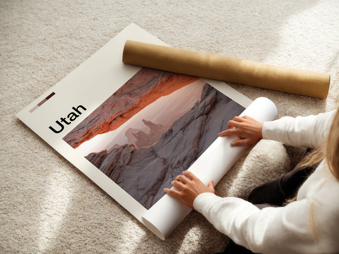 Utah Mesa Arch At Sunrise Travel Print being unrolled from its postal tube