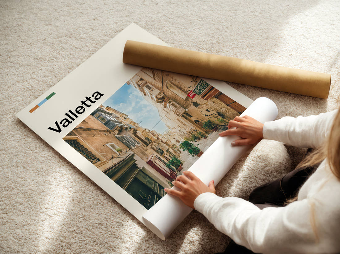 Valletta Narrow Street Travel Print being unrolled from its postal tube