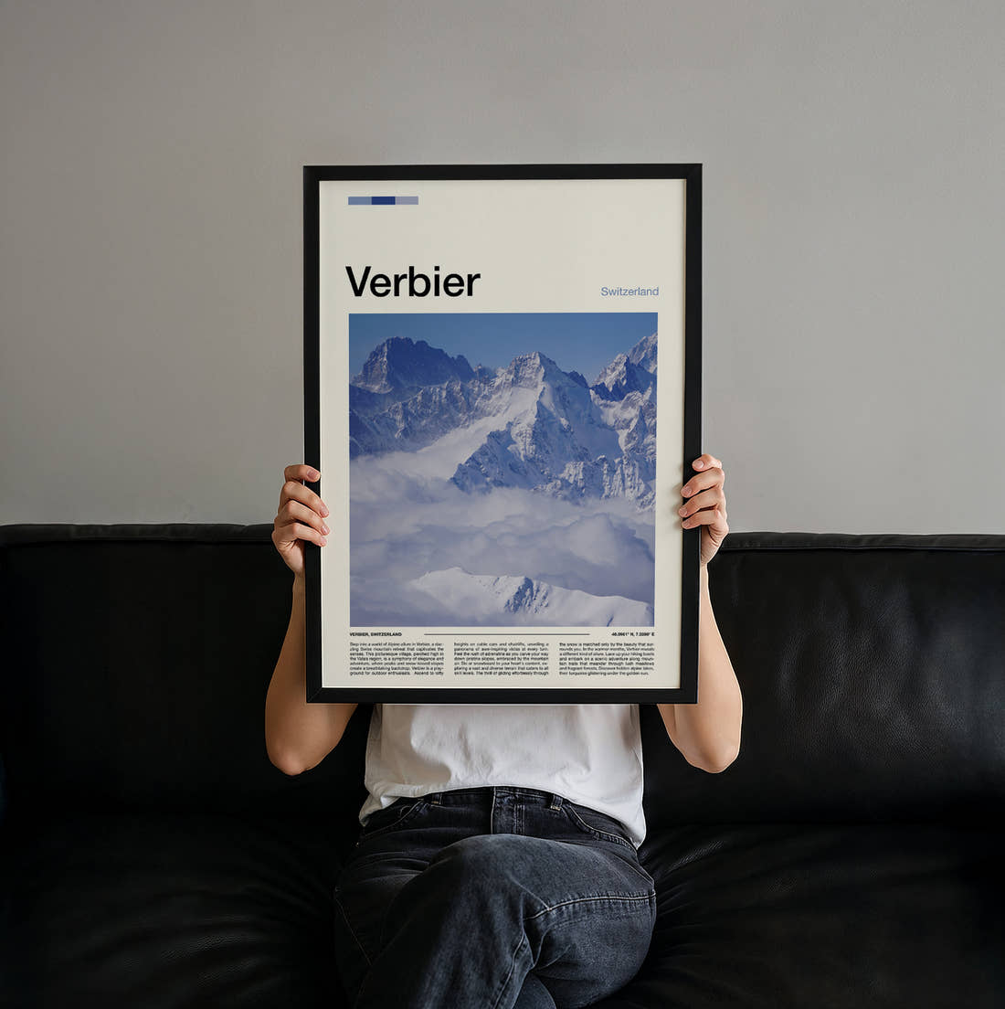 Verbier Peaks Above The Clouds Travel Print held up by hand to show the size of the print