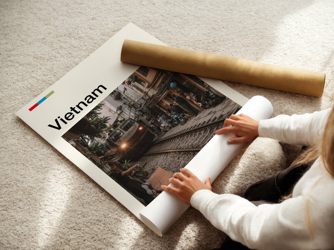 Vietnam Train Street Travel Print being unrolled from its postal tube
