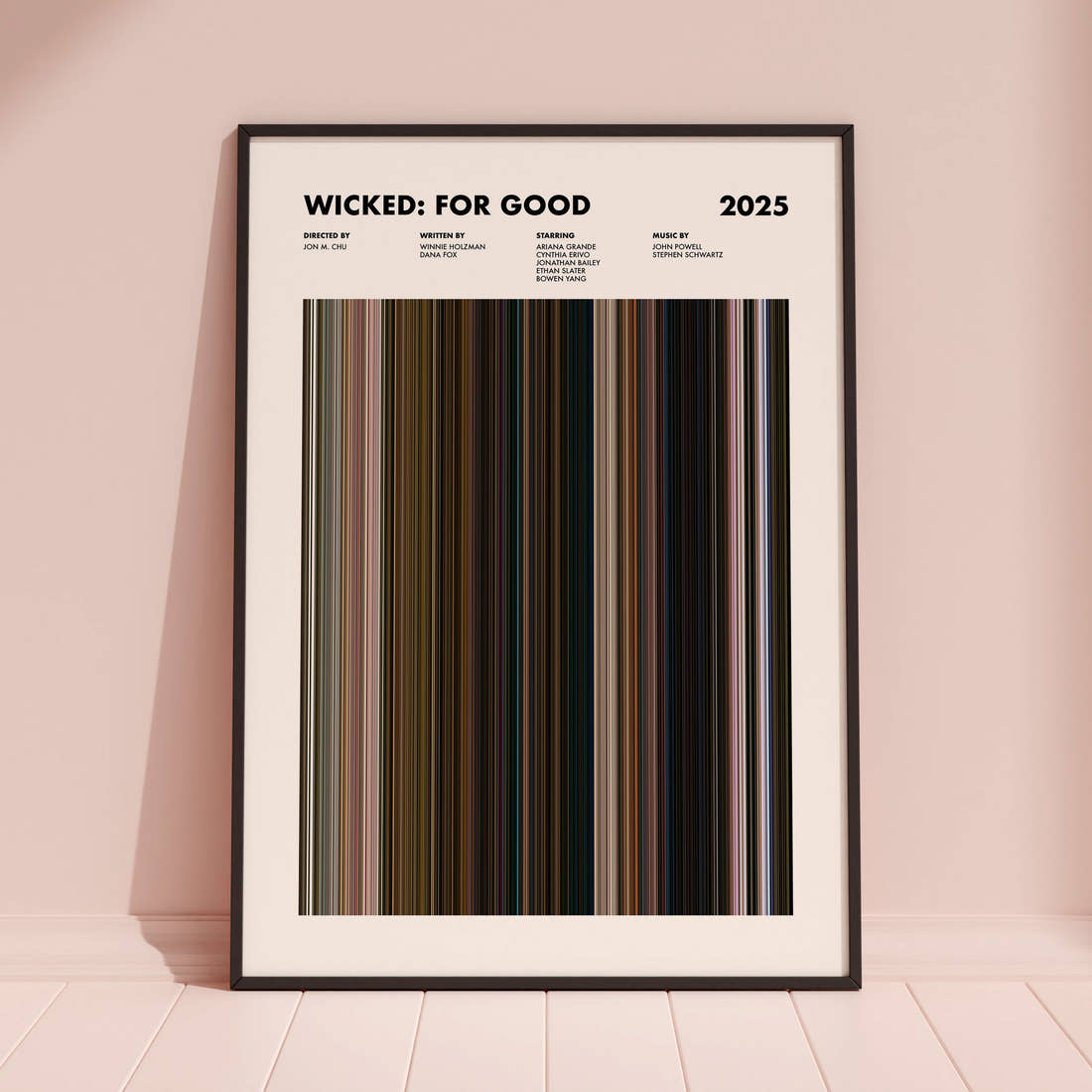 Wicked: For Good Movie Barcode Poster framed and leaning against a coloured wall