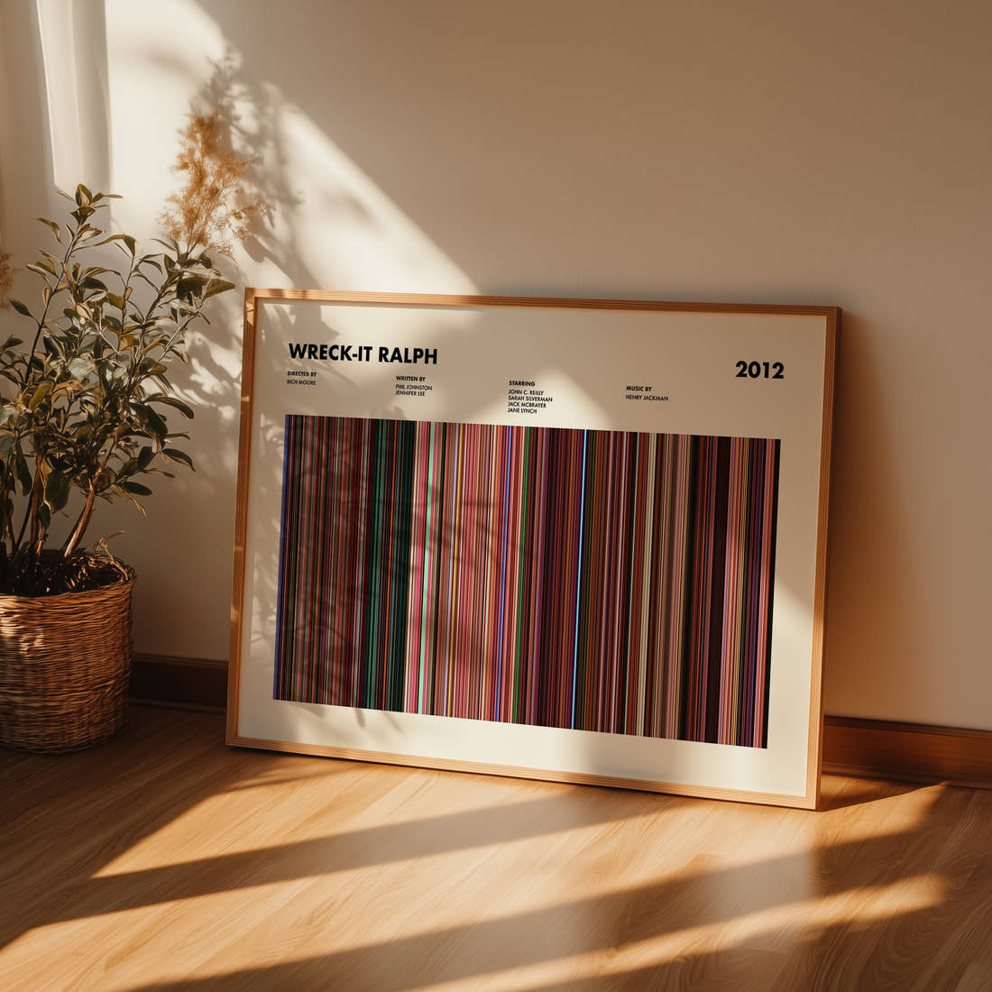 Wreck-It Ralph Movie Barcode Poster framed and leaning against a wall on a wooden floor