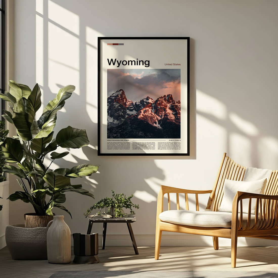 Wyoming Rugged Mountain Peaks Travel Print framed on a pale wall beside houseplants