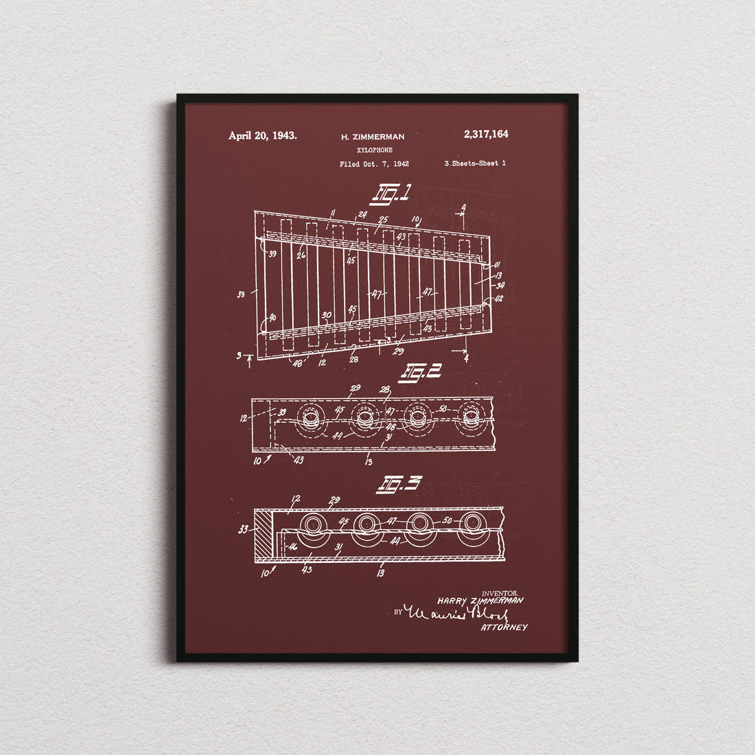 Xylophone Patent Print in the burgundy colourway, framed