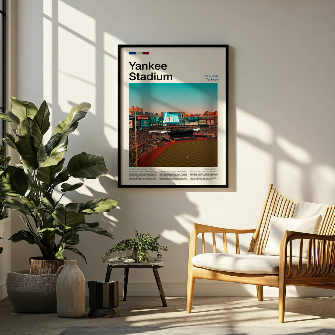 Yankee Stadium Print framed on a pale wall beside houseplants