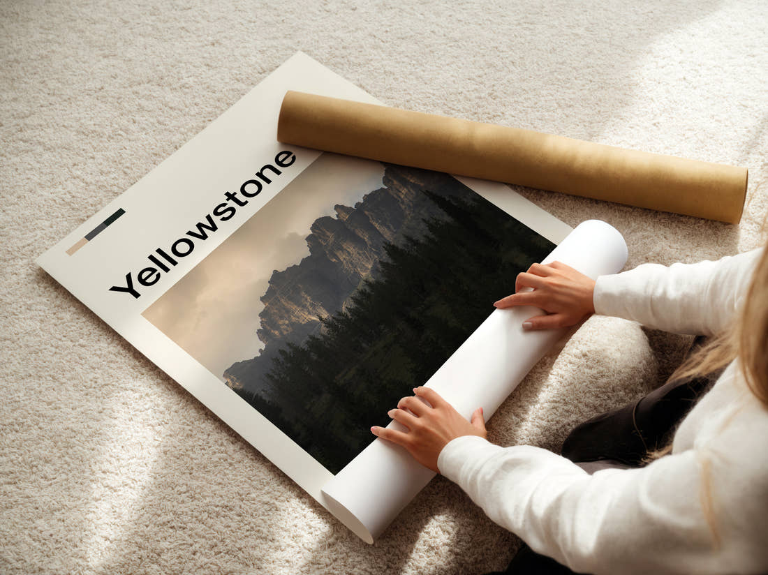 Yellowstone Rocky Spires Above Forest Travel Print being unrolled from its postal tube