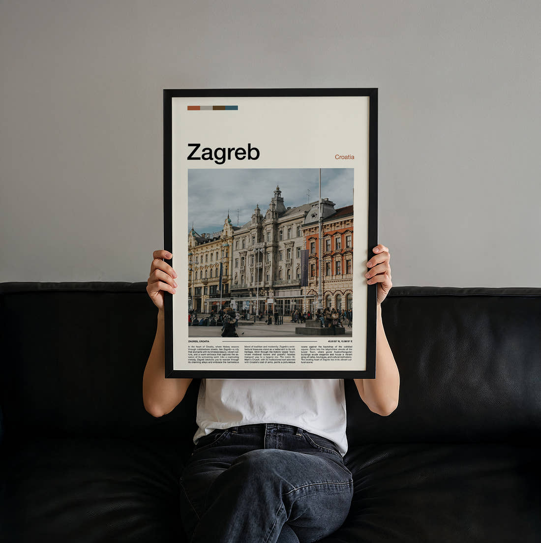 Zagreb Grand Square Facades Travel Print held up by hand to show the size of the print