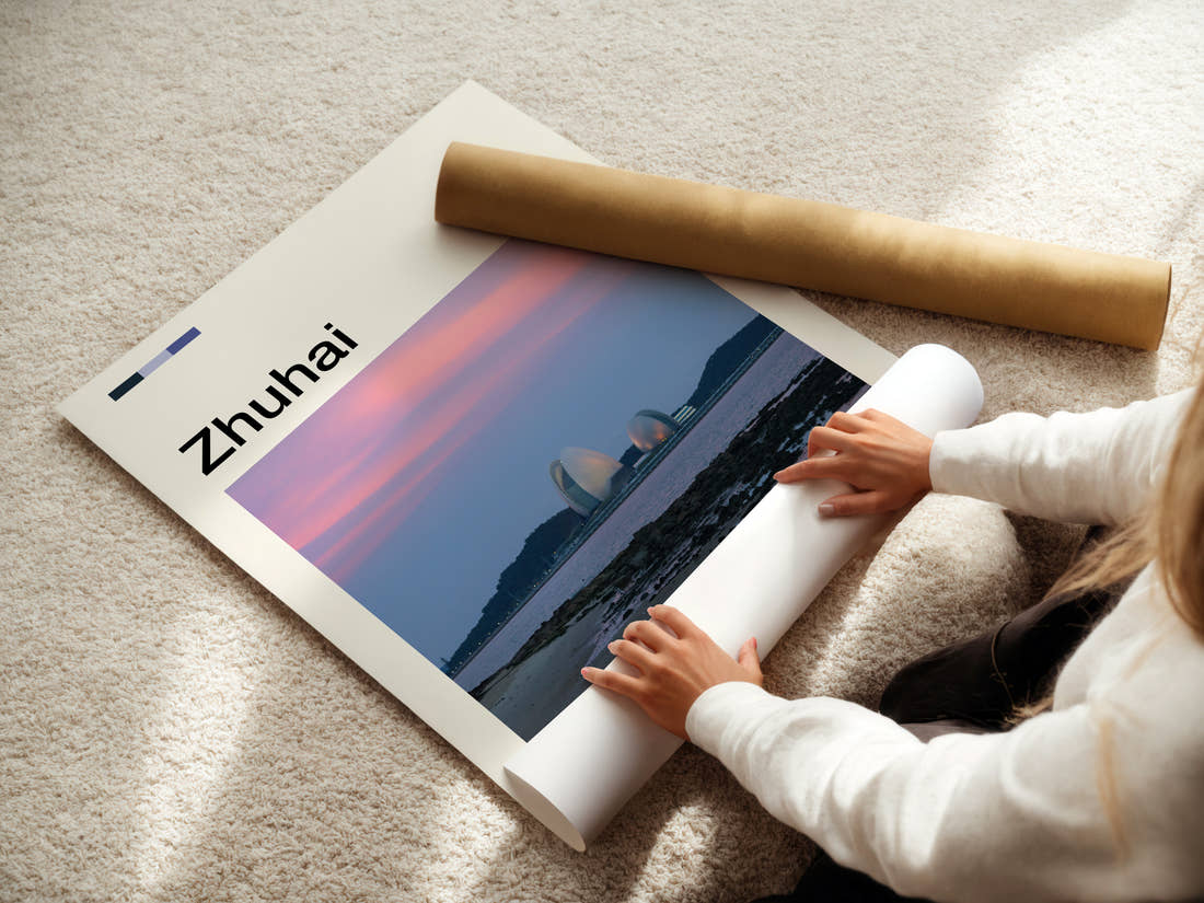 Zhuhai Sunset Bay Skyline Travel Print being unrolled from its postal tube